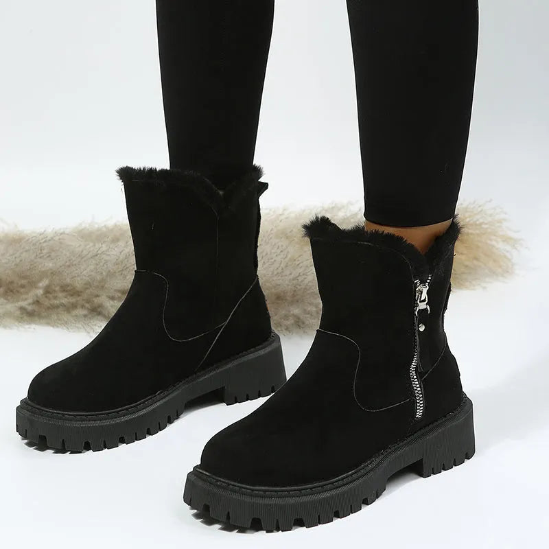Women's black faux suede snow boots with high top, square heel, and side zipper closure