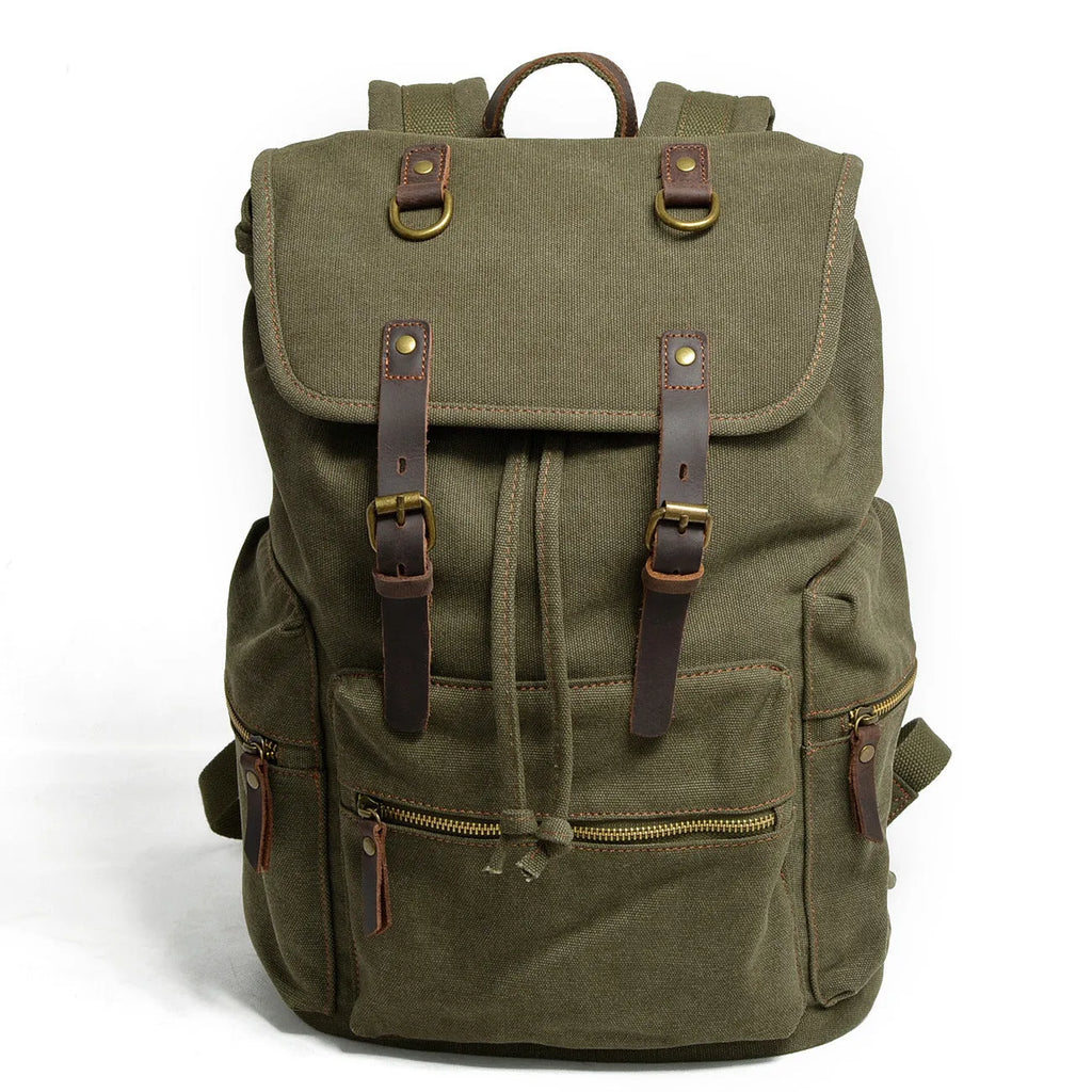 Canvas casual backpack with crazy horse leather trim in brown side view showing main compartment and shoulder strap