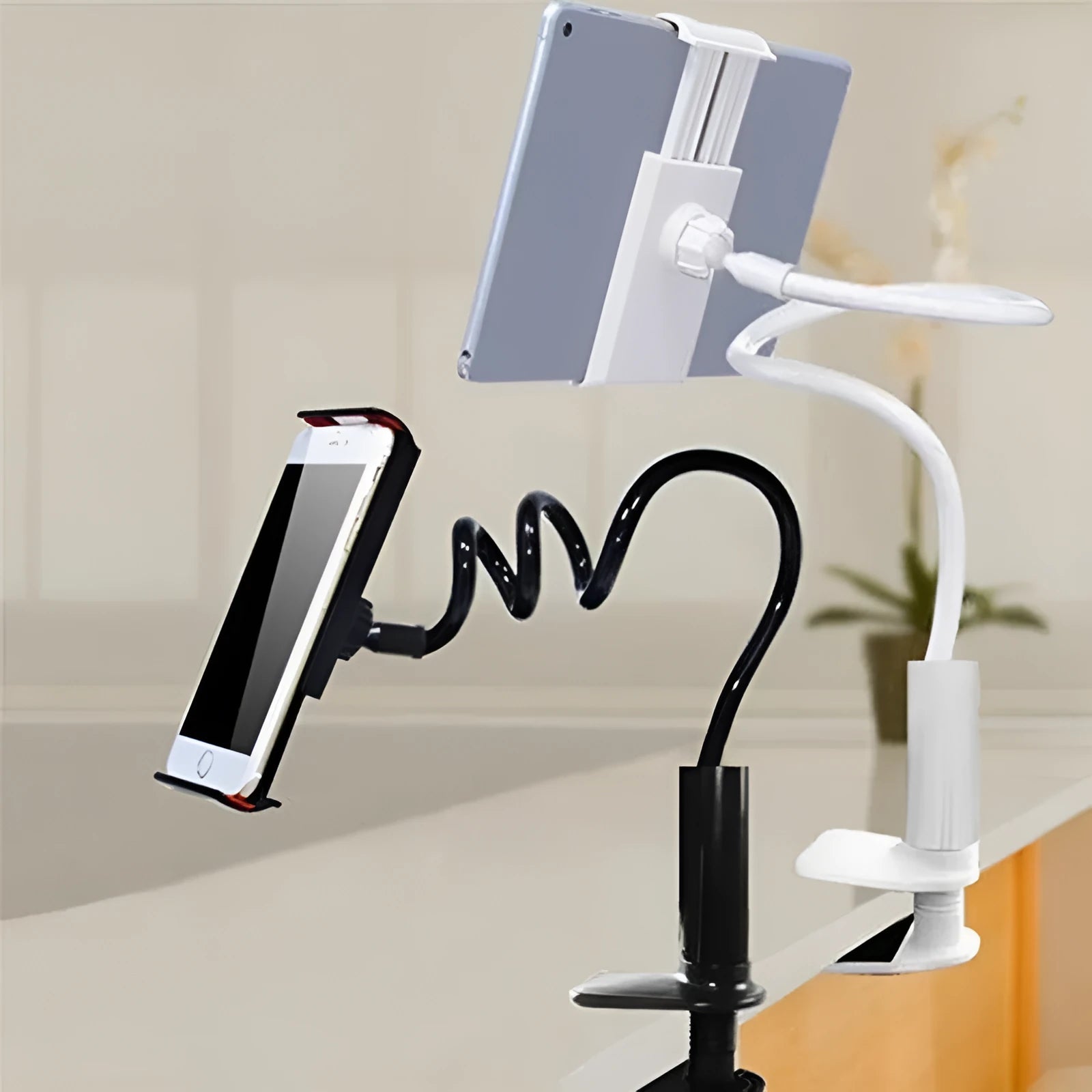 Flexible mount holder with suction base holding a phone at adjustable angle