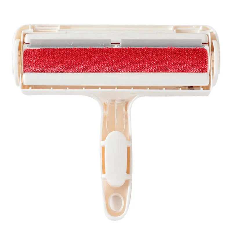 White plastic roller brush for pet hair removal on fabric surface