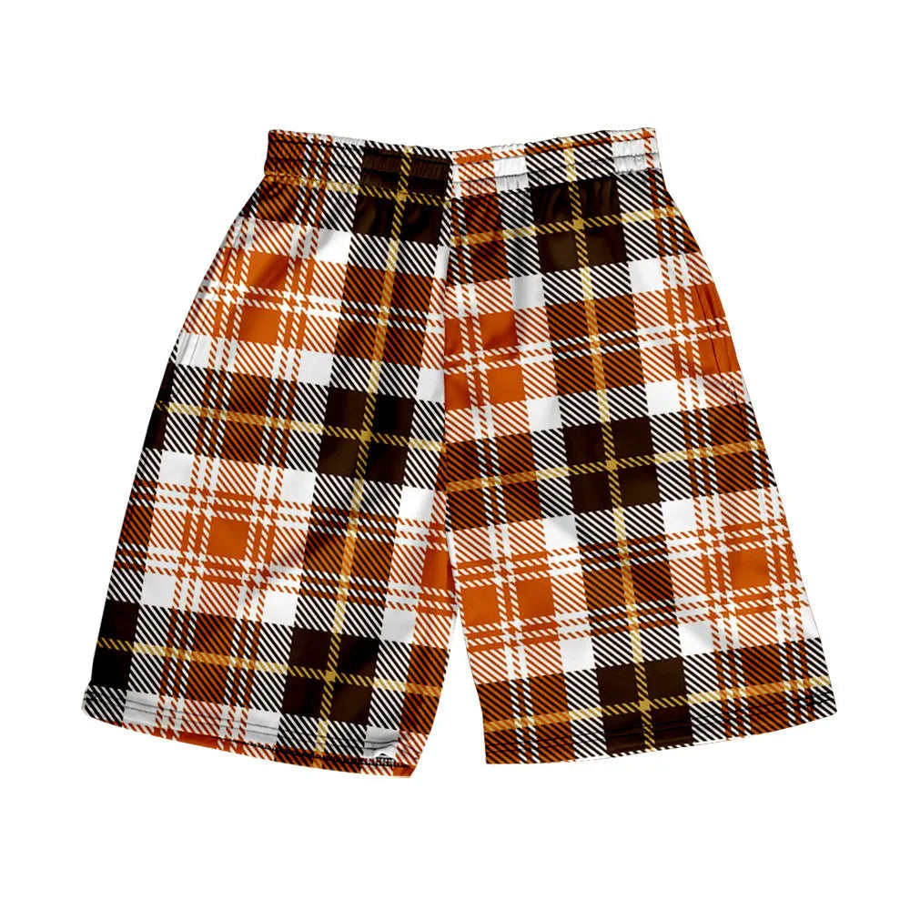 Man wearing plaid patterned casual shorts with an elastic waistband, straight legs, and a digital print design.