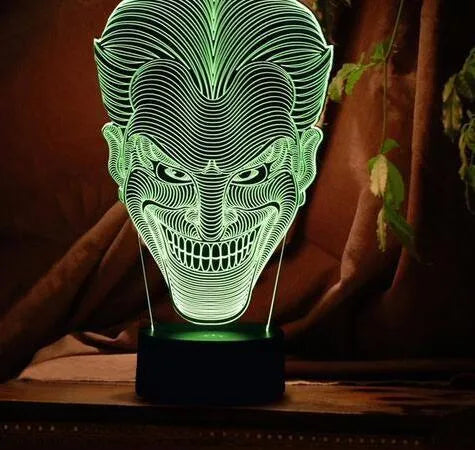 3D LED table lamp with acrylic base showing colourful gradient lighting, remote control, and USB cable