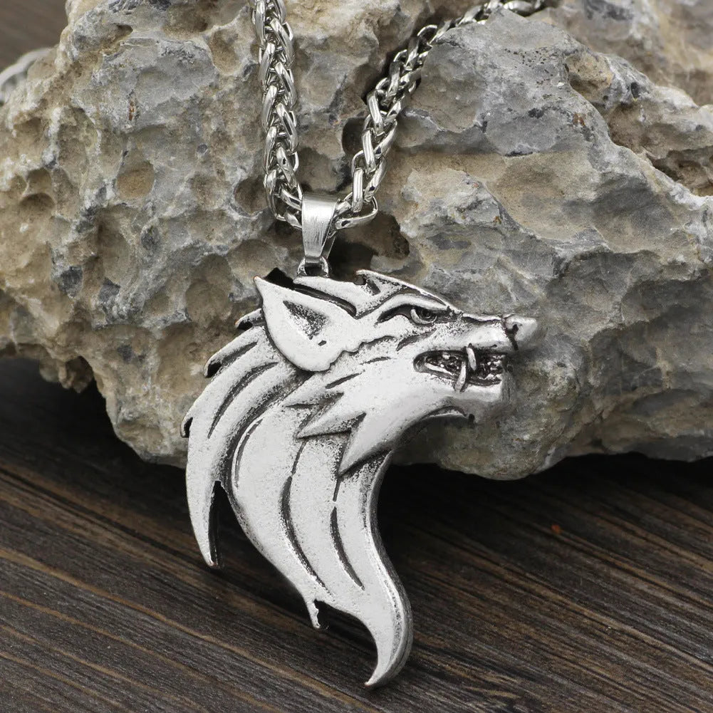 Men's wolf head pendant necklace in ancient silver or ancient bronze on a 58cm BS chain, Viking-style amulet.