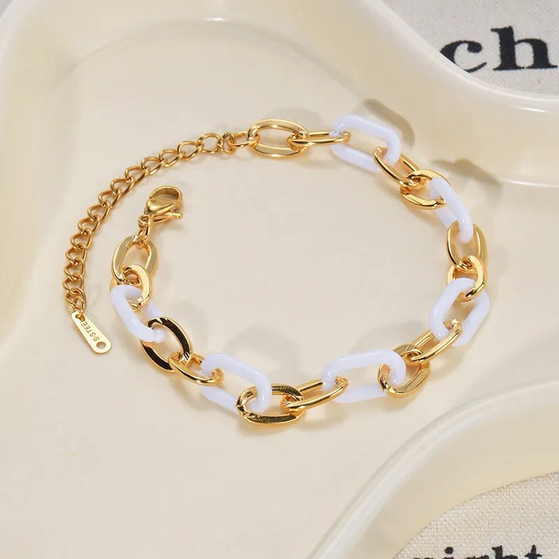 Stainless steel resin bracelet with a double-layer loving heart charm for women.