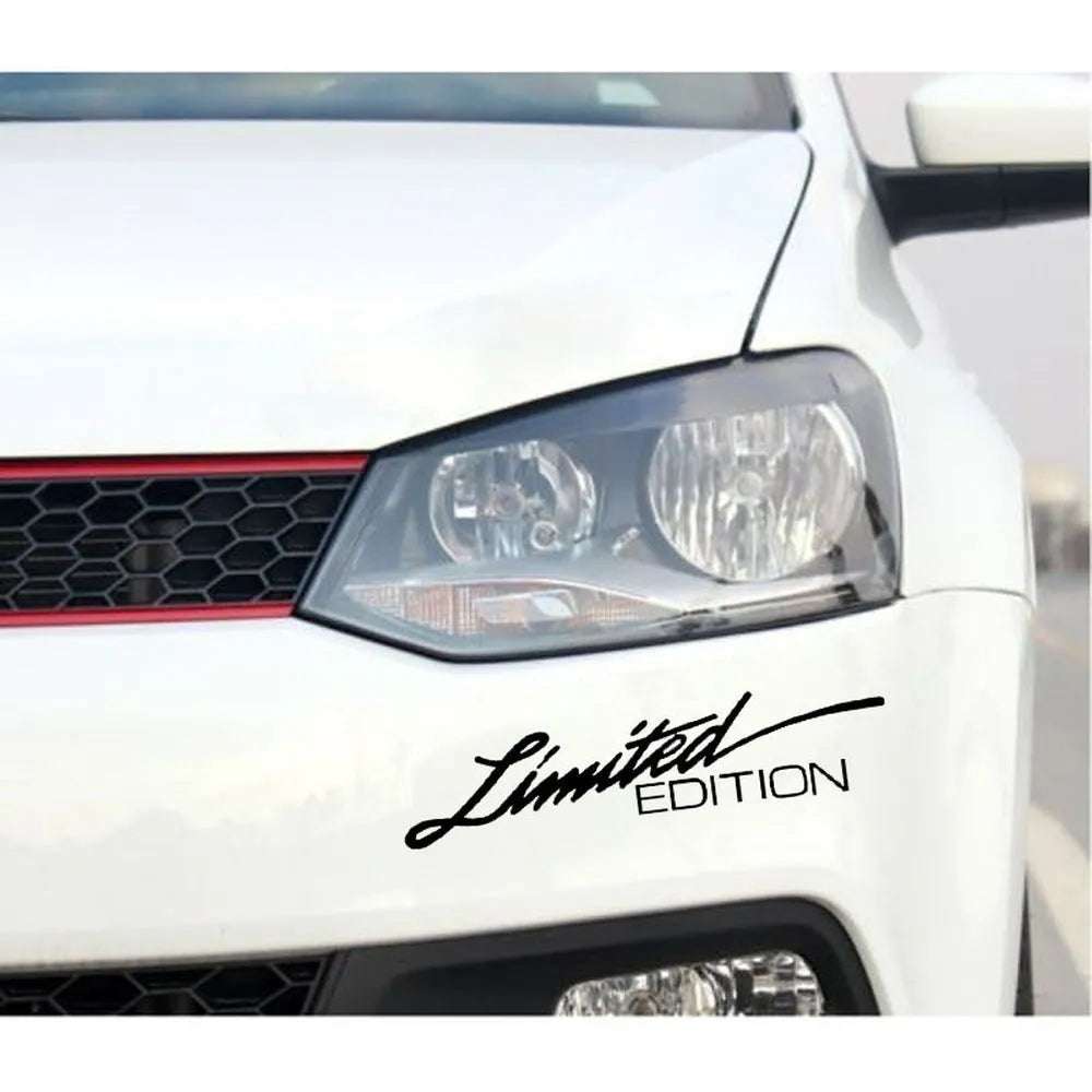 British reflective plastic bumper sticker shown in black, white and colourful variants, dimensions 16cm by 3.8cm.