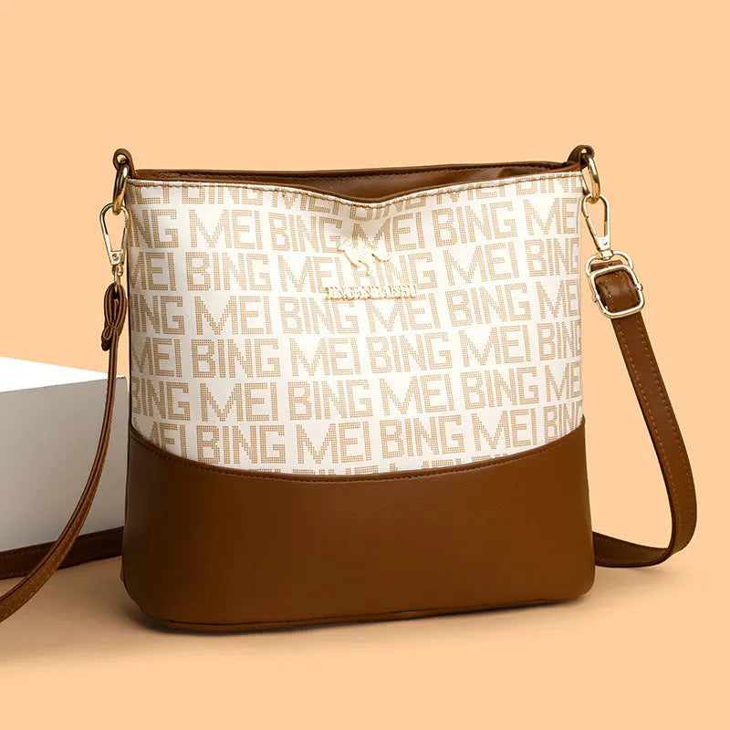 Retro soft PU messenger bag in brown with sewing thread detail and horizontal square shape