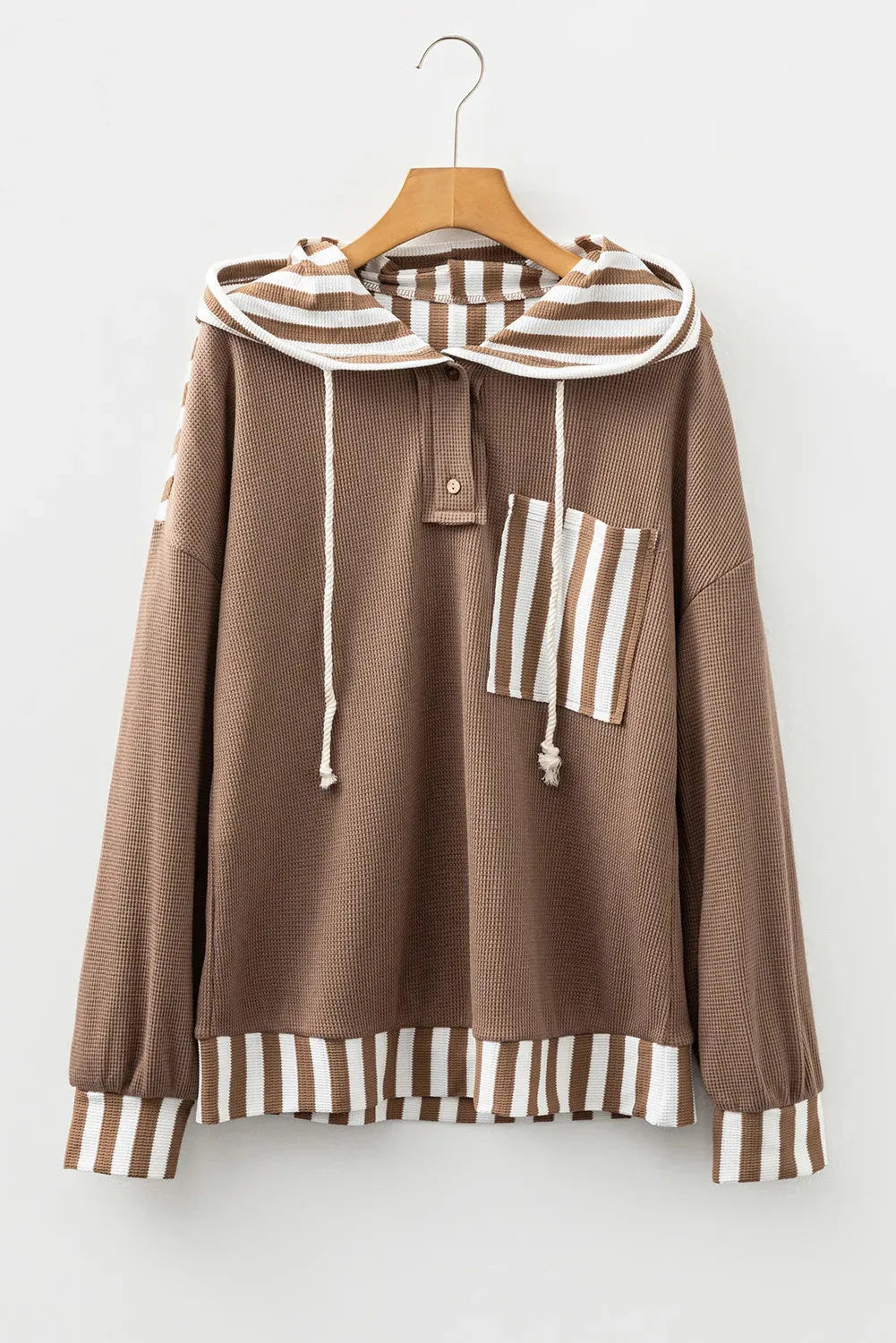 Straw yellow hoodie with waffle texture stripes and patchwork design featuring button neck and drawstring hood