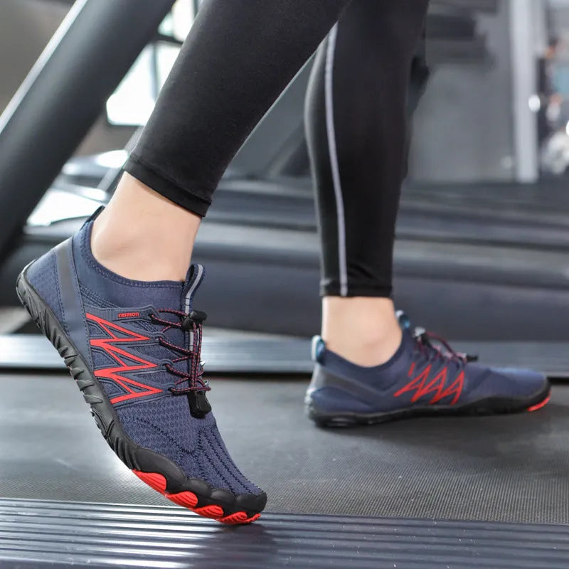 Indoor fitness training sneakers with non-slip rubber sole in various colours showing striped pattern and low top design
