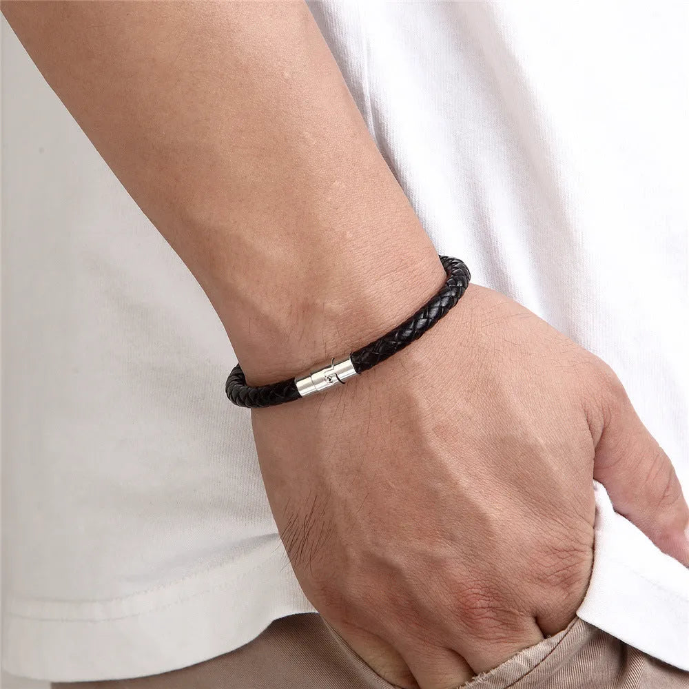 Geometric titanium steel men's bracelet with a magnet socket for charms, shown in a silver finish.