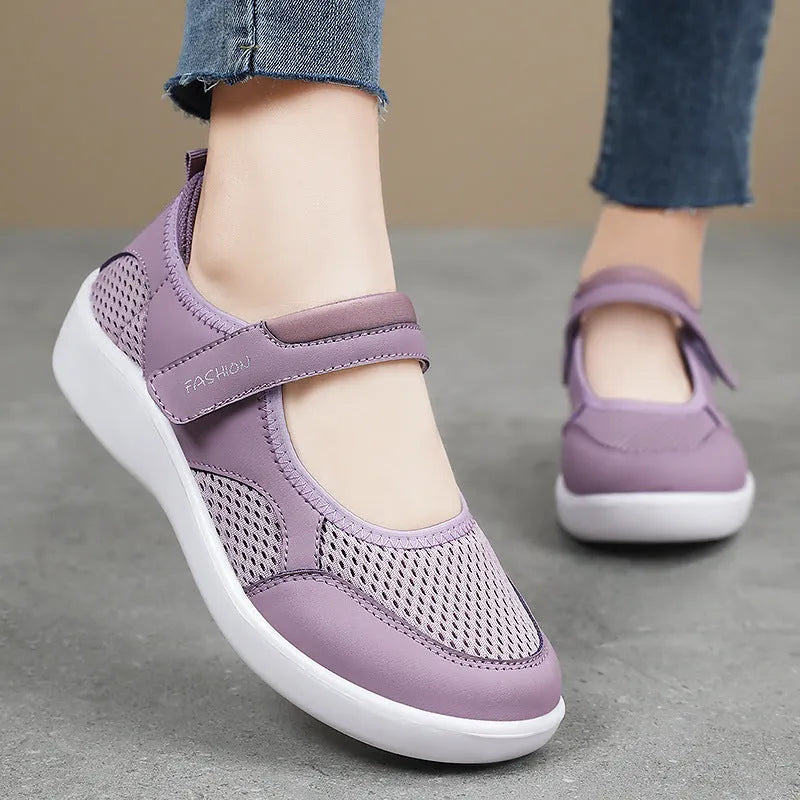 Women's breathable mesh casual shoes with Velcro closure in black, gray, pink, and red colours