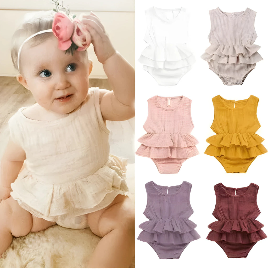 Baby girl sleeveless pettiskirt dress in cotton, shown in pink stripe, with dark buckle and no hood.