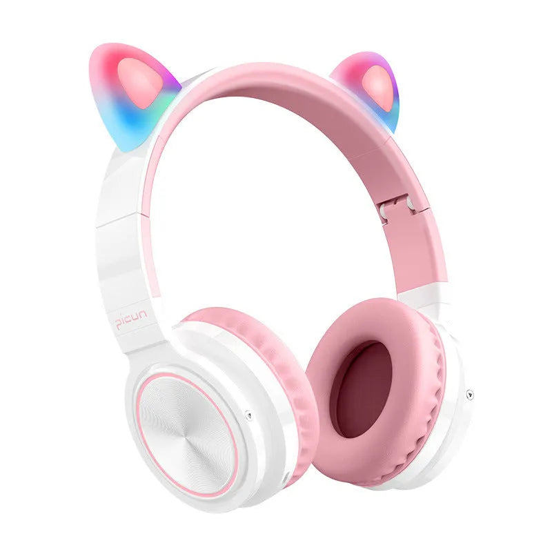 Pink and white Luminous wireless Bluetooth gaming headset with over-ear earcups and a braided cable.