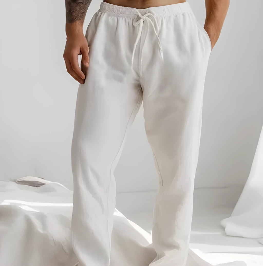 Men's light grey loose-fit summer trousers with a drawstring elastic waist and straight legs.