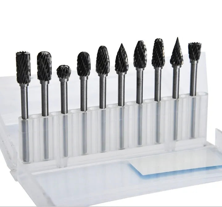 Ten tungsten steel carbide rotary burrs with 6mm head and 3mm shank arranged on a white background