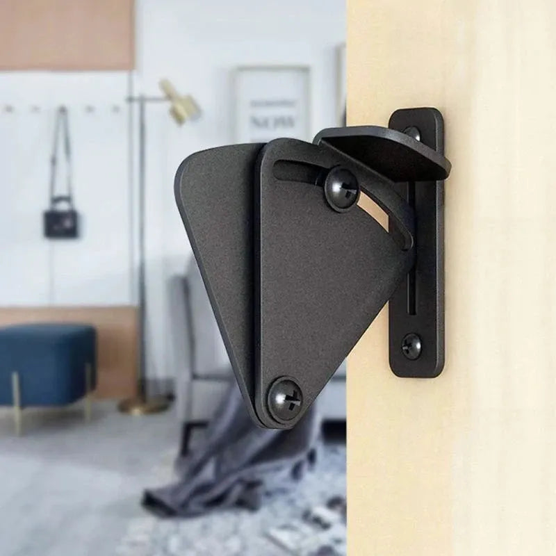 Black stainless steel sliding barn door lock shown in S and M sizes.