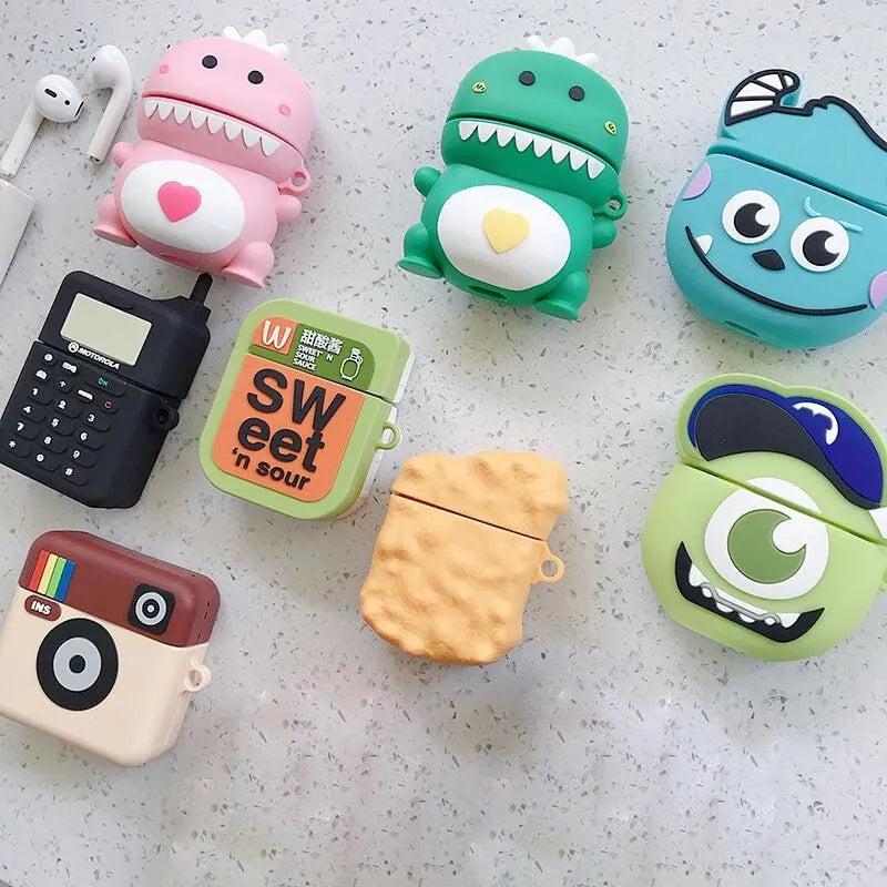 Green silicone protective case for AirPods 1 and 2 with a cartoon animal design on the front.
