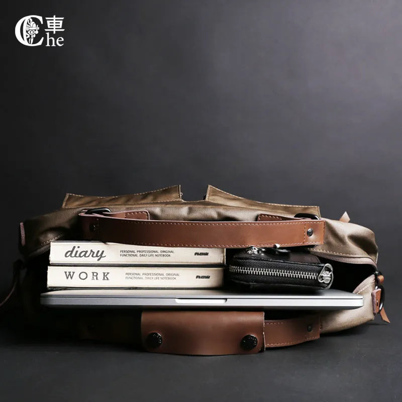 Dpark black laptop messenger bag for 15-inch Apple Lenovo computers on a shoulder.