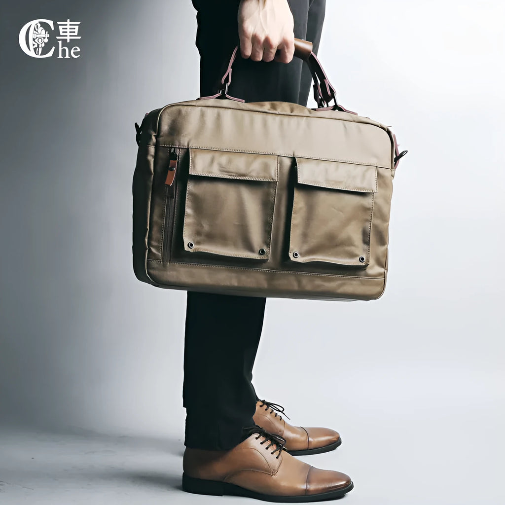 Dpark black laptop messenger bag for 15-inch Apple Lenovo computers on a shoulder.