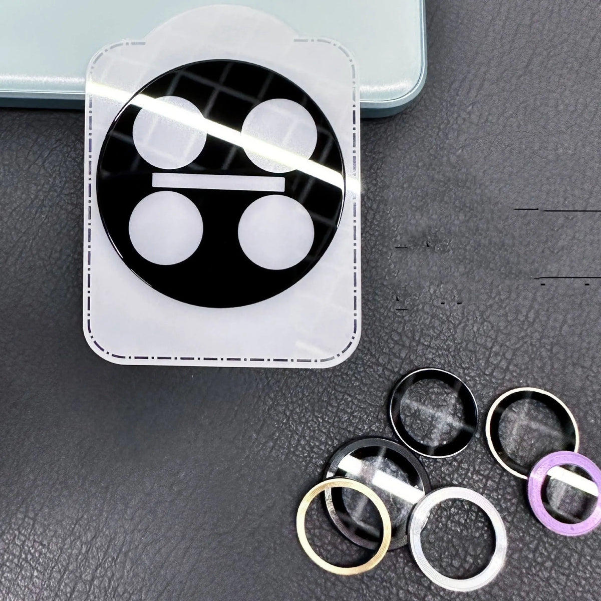 Tempered glass camera lens protector for OnePlus 12, Find N3, and OnePlus 11 phones with black ring design.