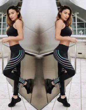 Women's black glow-in-the-dark fitness leggings with reflective print in pencil pants style