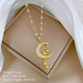 Moon tassel necklace with geometric design and diamond elements on stainless steel chain