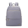 Women's large capacity oxford cloth backpack in black, showing front compartments and shoulder straps.