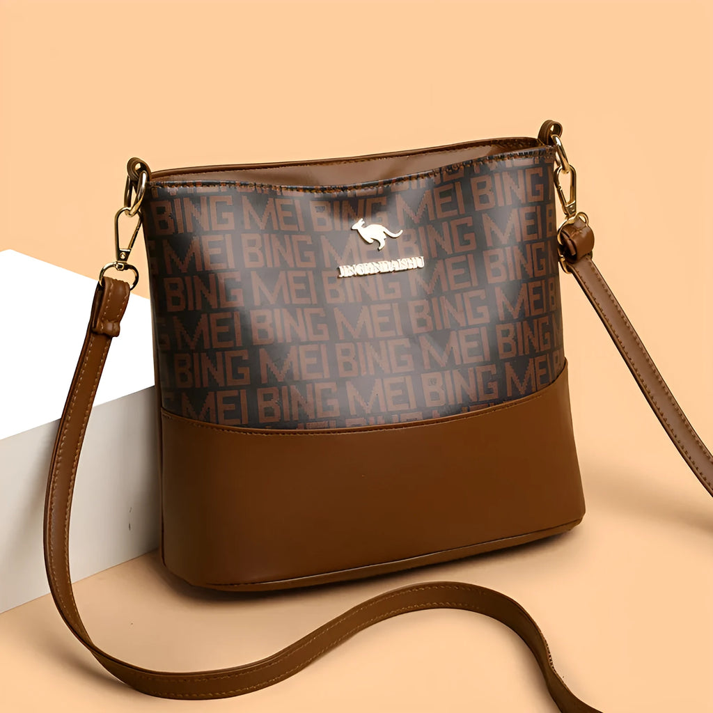 Retro soft PU messenger bag in brown with sewing thread detail and horizontal square shape