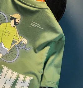 Green loose fit men's printed t-shirt with short sleeves on hanger