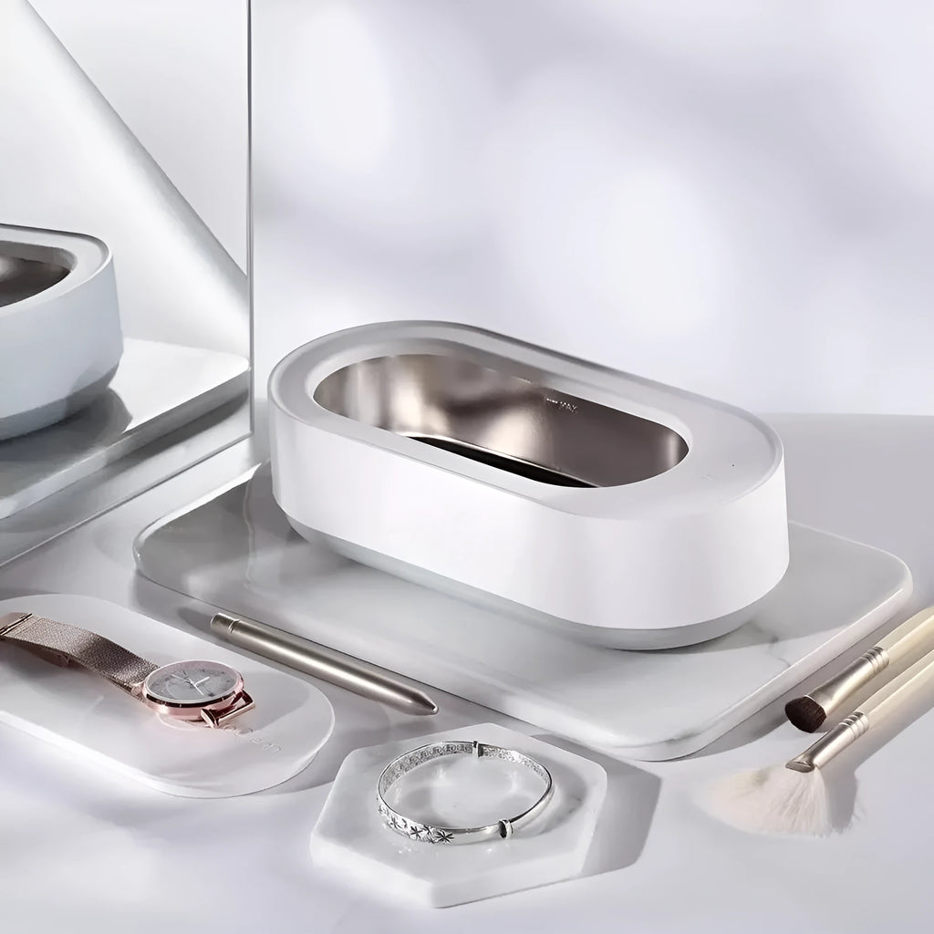 White portable ultrasonic cleaning machine with stainless steel tank and touch button.