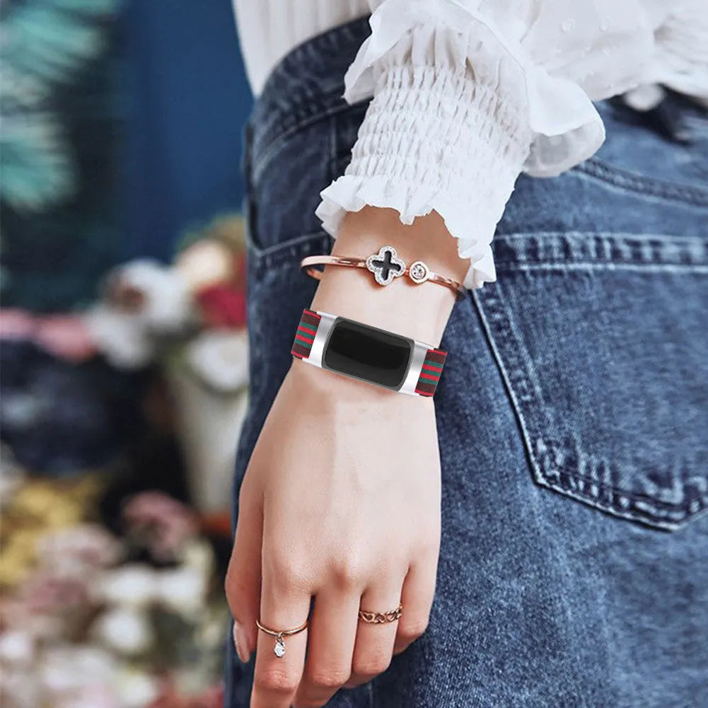 Printed elastic watch strap for Fitbit Charge 6 showing rainbow pattern design