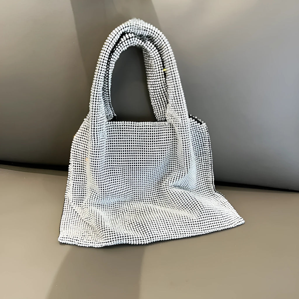 Silver shiny rhinestone handbag made of cotton thread with open pocket, designed for evening parties and dinners.