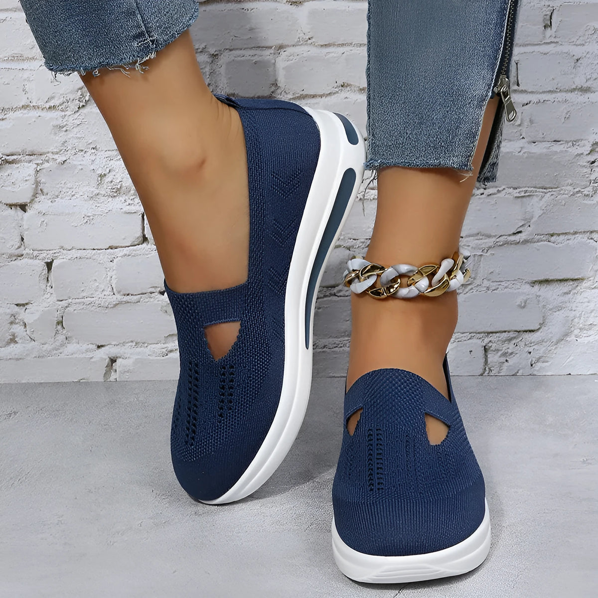 Flat platform wedge casual sneakers with mesh upper, round toe, and rubber sole in black, blue, and pink colours