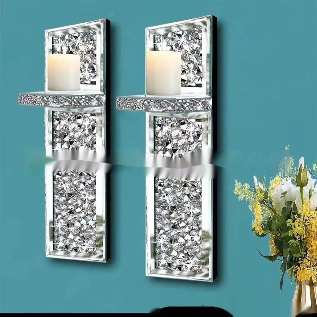 Pair of silver mirror glass candlestick holders for wall mounting, 38cm tall.
