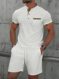 Men's grey waffle texture two-piece summer suit with zipper polo collar short sleeve top and matching shorts