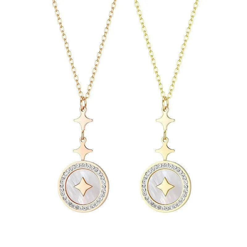 Gold titanium steel women's necklace with hexagonal star pendant on O-ring chain.