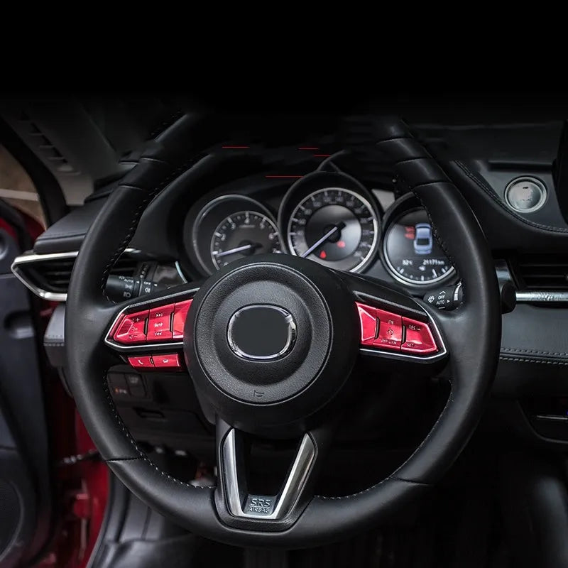 Eight aluminium alloy steering wheel decorative stickers with hollow button design in brushed metallic finishes