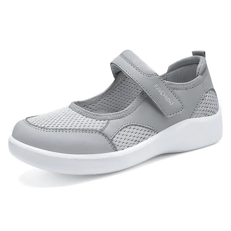 Women's breathable mesh casual shoes with Velcro closure in black, gray, pink, and red colours