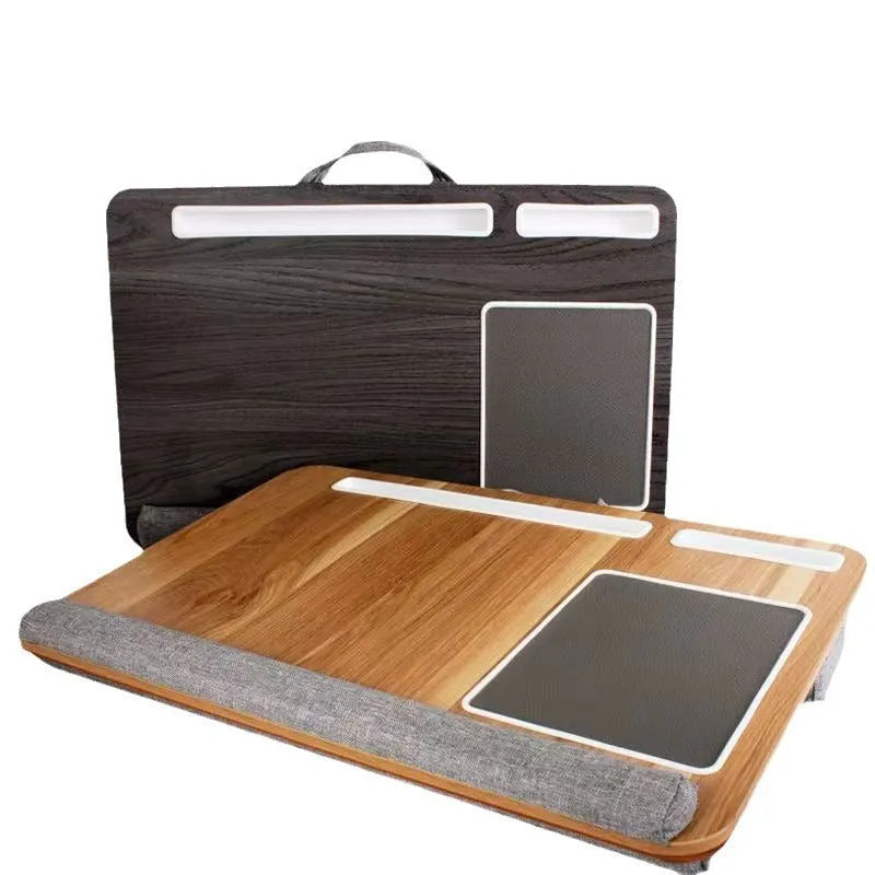 Foldable laptop bed desk with black walnut finish, open and ready for use on a bed