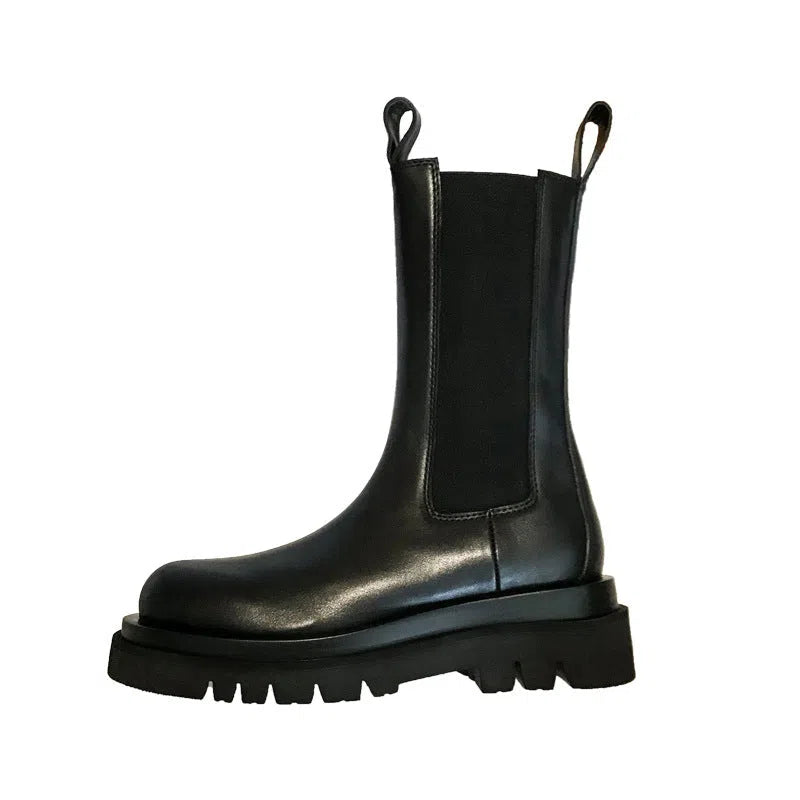 Women's black mid-calf boots with chunky low heel, round toe, and wear-resistant rubber sole in British style