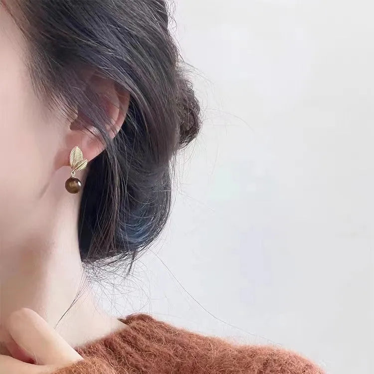 Alloy geometric stud earrings for women in colour 7400