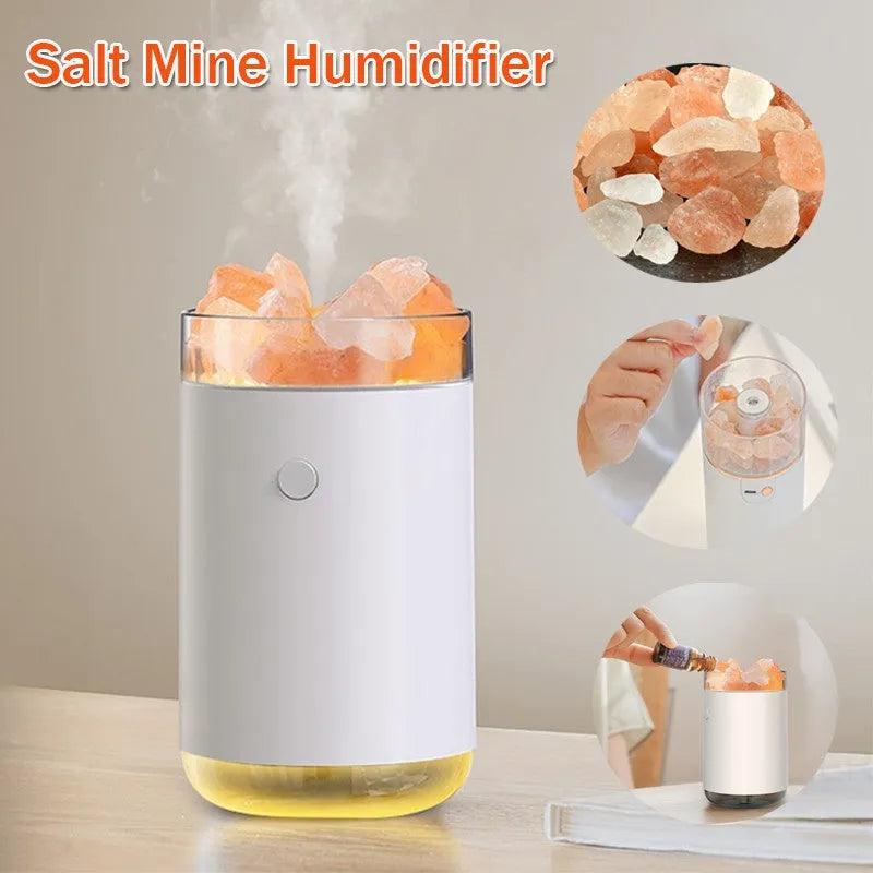 Ultrasonic aromatherapy diffuser humidifier with natural crystal salt stone and LED lamp in blue, showing mist and light
