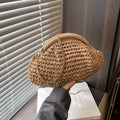 Women's straw beach shoulder bag in shell shape with chain details