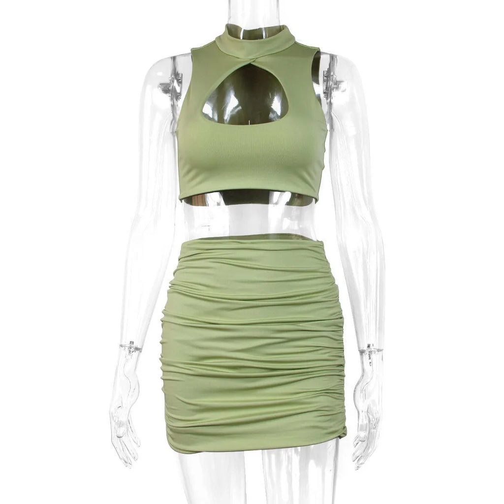 Light purple women's hollow vest and split skirt two-piece co-ord set on a model.