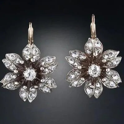 Silver retro fashion earrings for women with creative design and electroplated finish