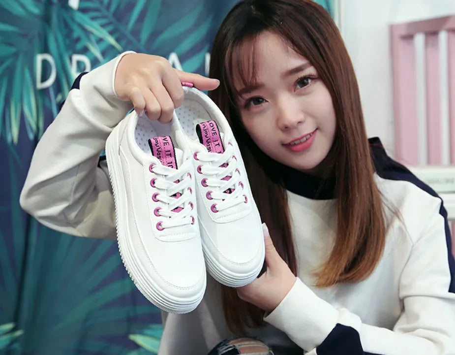 Breathable women canvas sneaker in black with microfiber leather upper, lace-up design, and rubber outsole