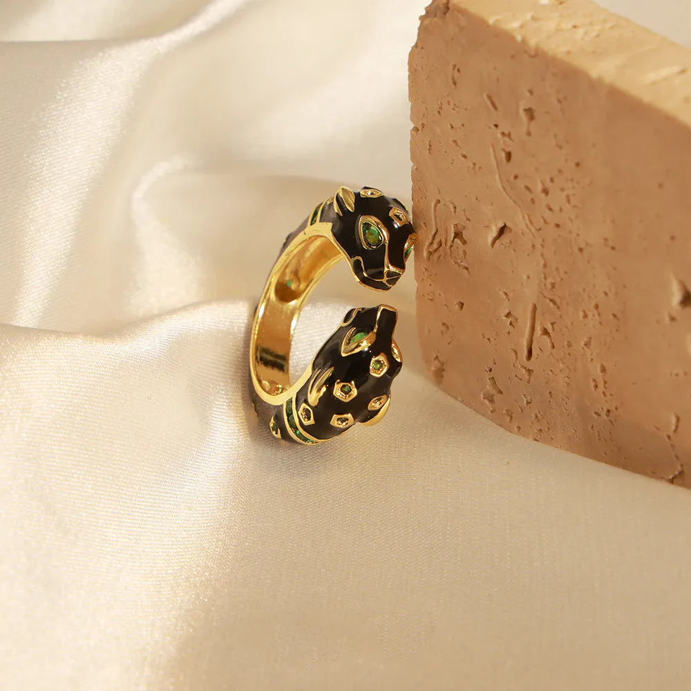 Women's copper geometric open ring with black electroplated cheetah pattern, shown in size 7.