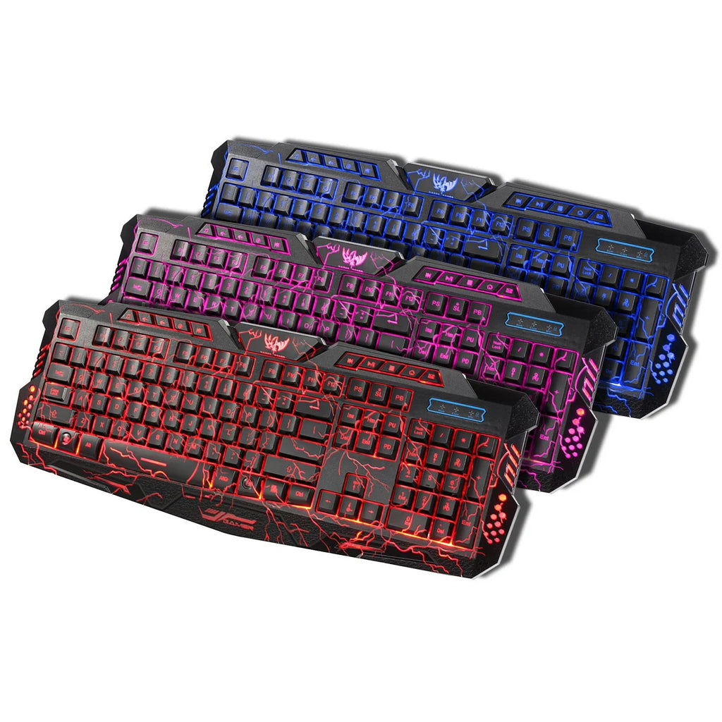 Black backlit gaming keyboard with crack design and three-colour adjustable backlight on a desk