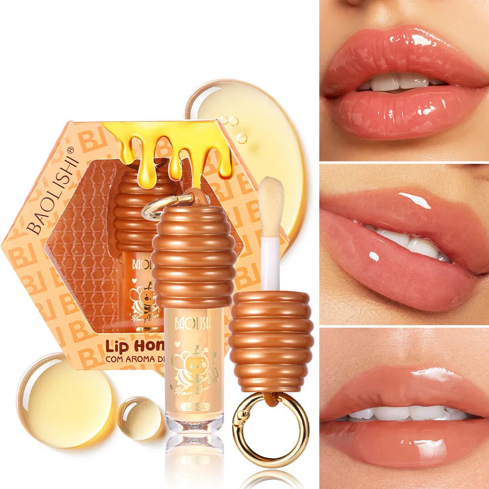 Honey coloured lip gloss with keychain attachment for bags