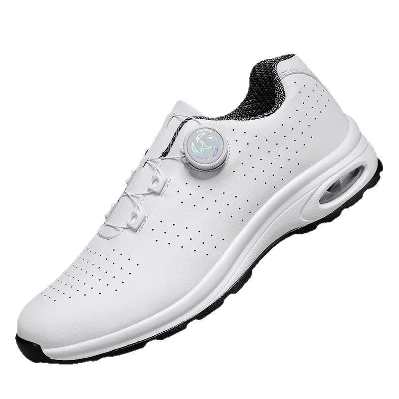 Low-top black and white mesh casual shoes with cross shoulder strap and round toe on a composite sole.
