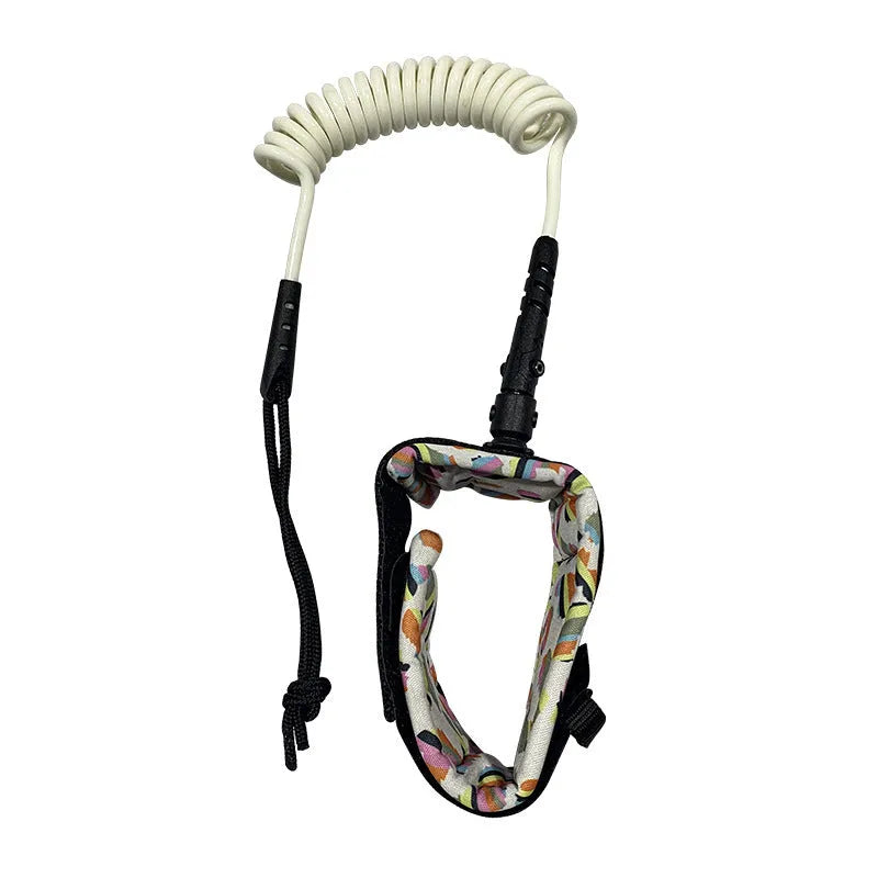 A single coil of coloured surfboard leash rope with high elasticity, rated for 50kg maximum tension.